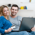 buyer journey - young couple with laptop shopping online